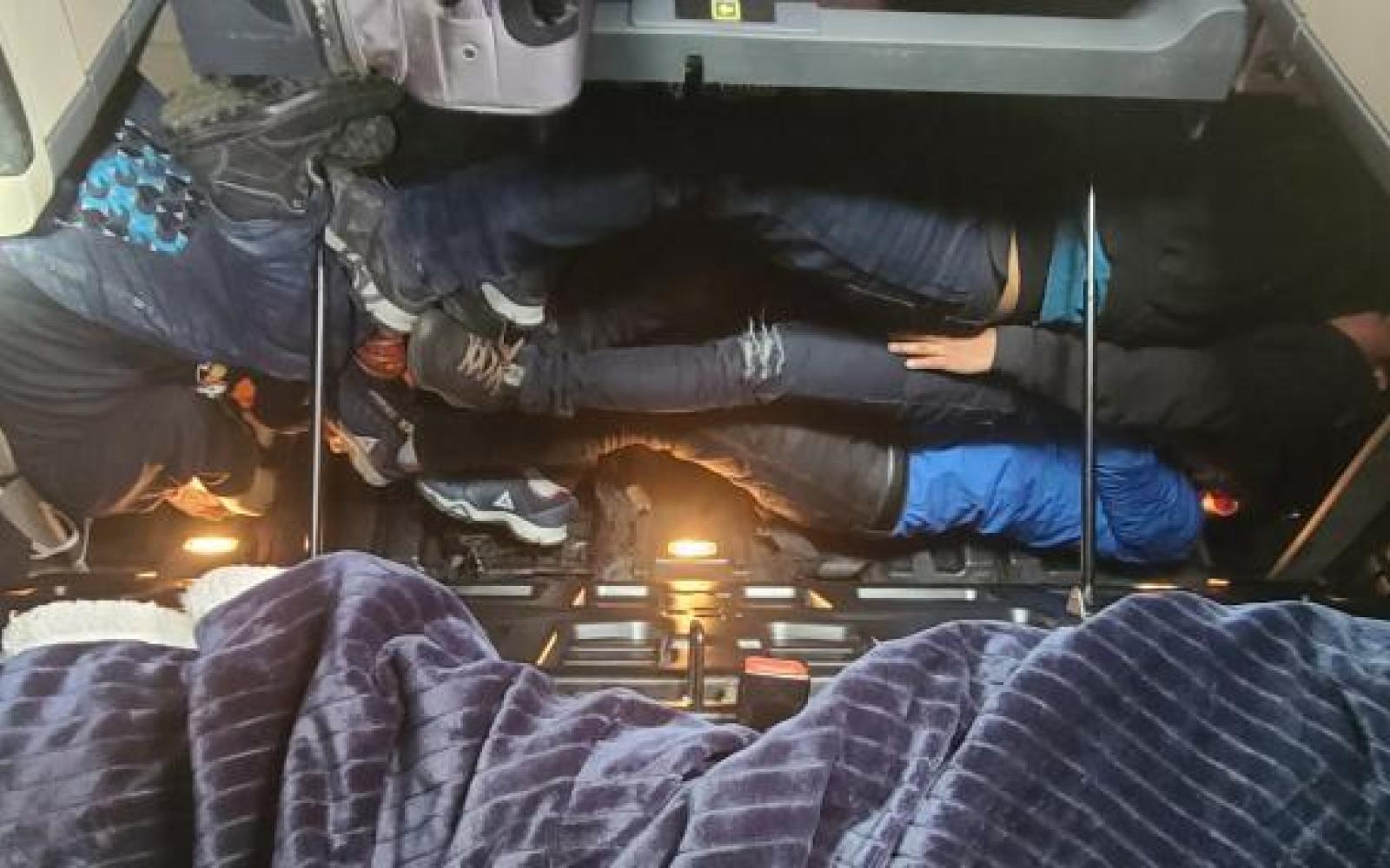 Illegal Aliens Stacked in Truck (Contributed/CBP)