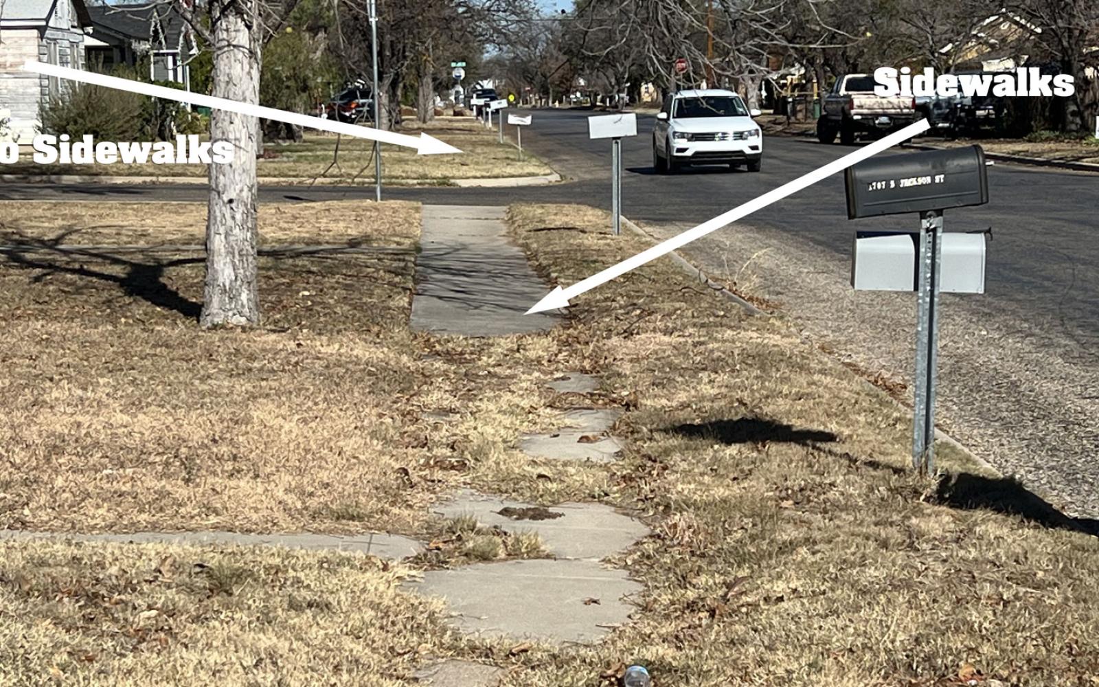 What is left of sidewalks built with these homes on S. Jackson St. in a neighborhood established in 1959 