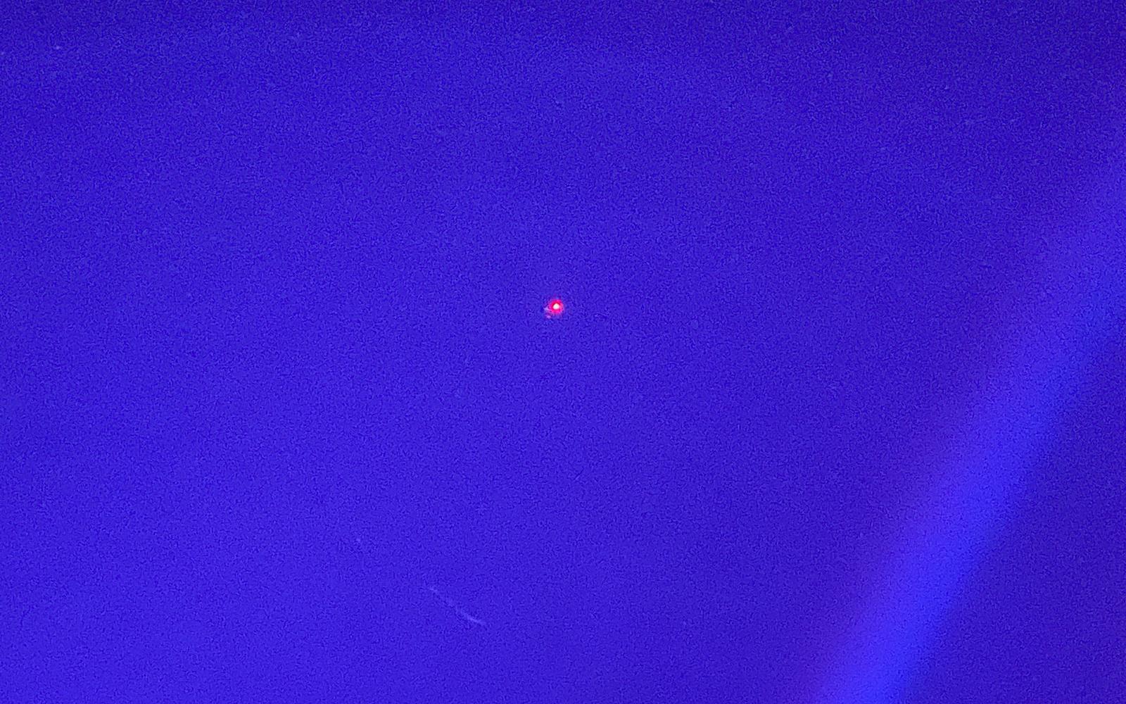 The red light is a law enforcement drone apparently being used to search for a fugitive at the crash on US 67 just northeast of the 12-Mile Bridge on July 17, 2022.