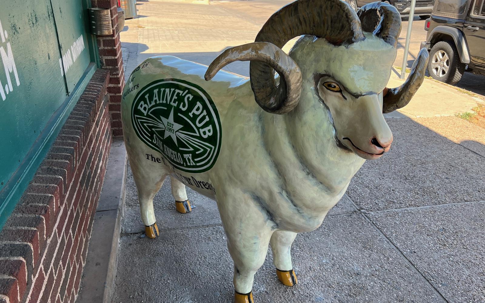 The ram bolted down in front of Blaine's Pub was unveiled on July 7, 2022
