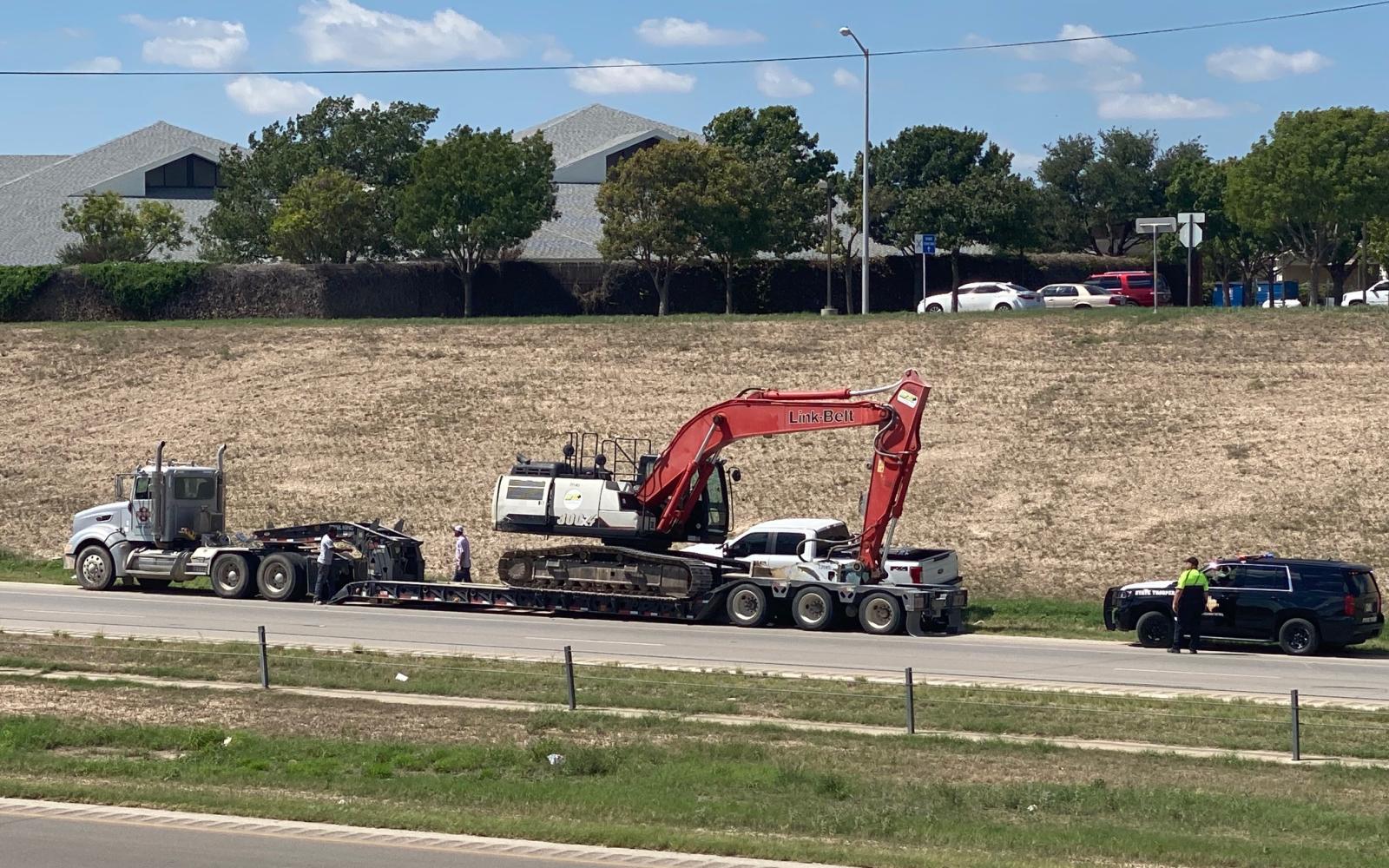 Excavator Hits Main St. Bridge (LIVE! Photo/James Bouligny)