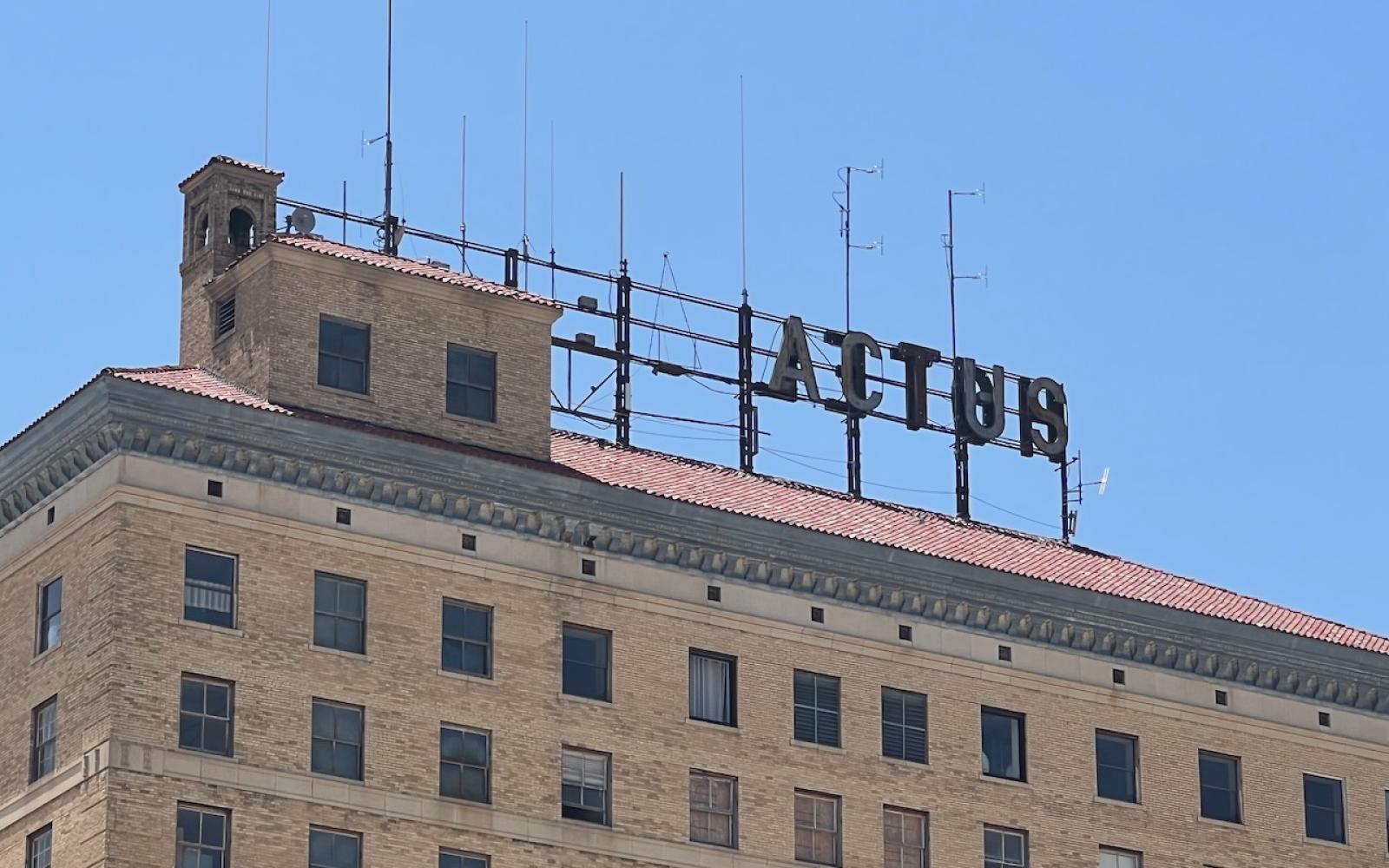 The broken sign atop the iconic Cactus Hotel in downtown San Angelo, Texas. 