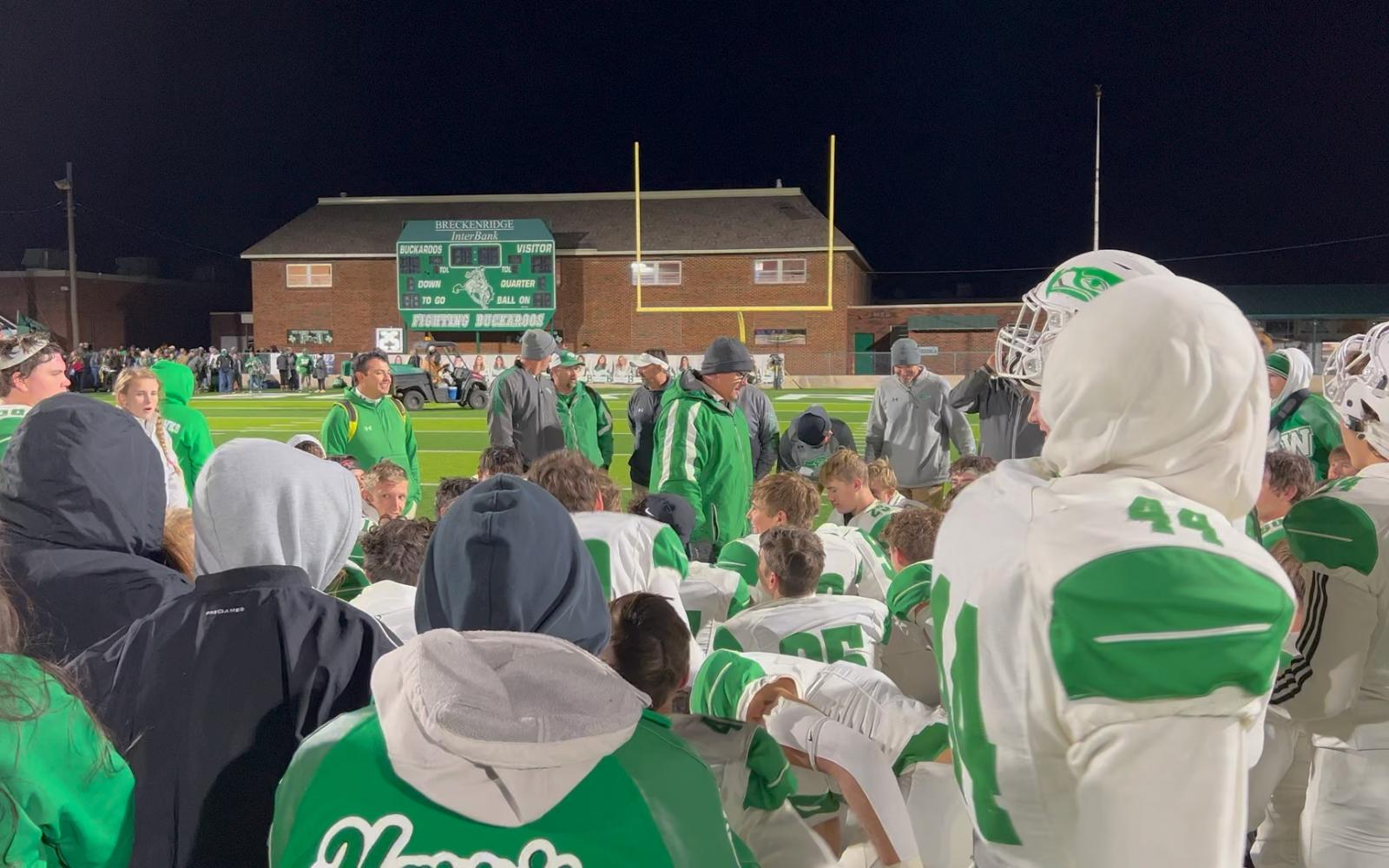 Head Coach Houston Guy congratulates his team after a 44-10 victory over Childress in the 2nd round of the 2022 playoffs.