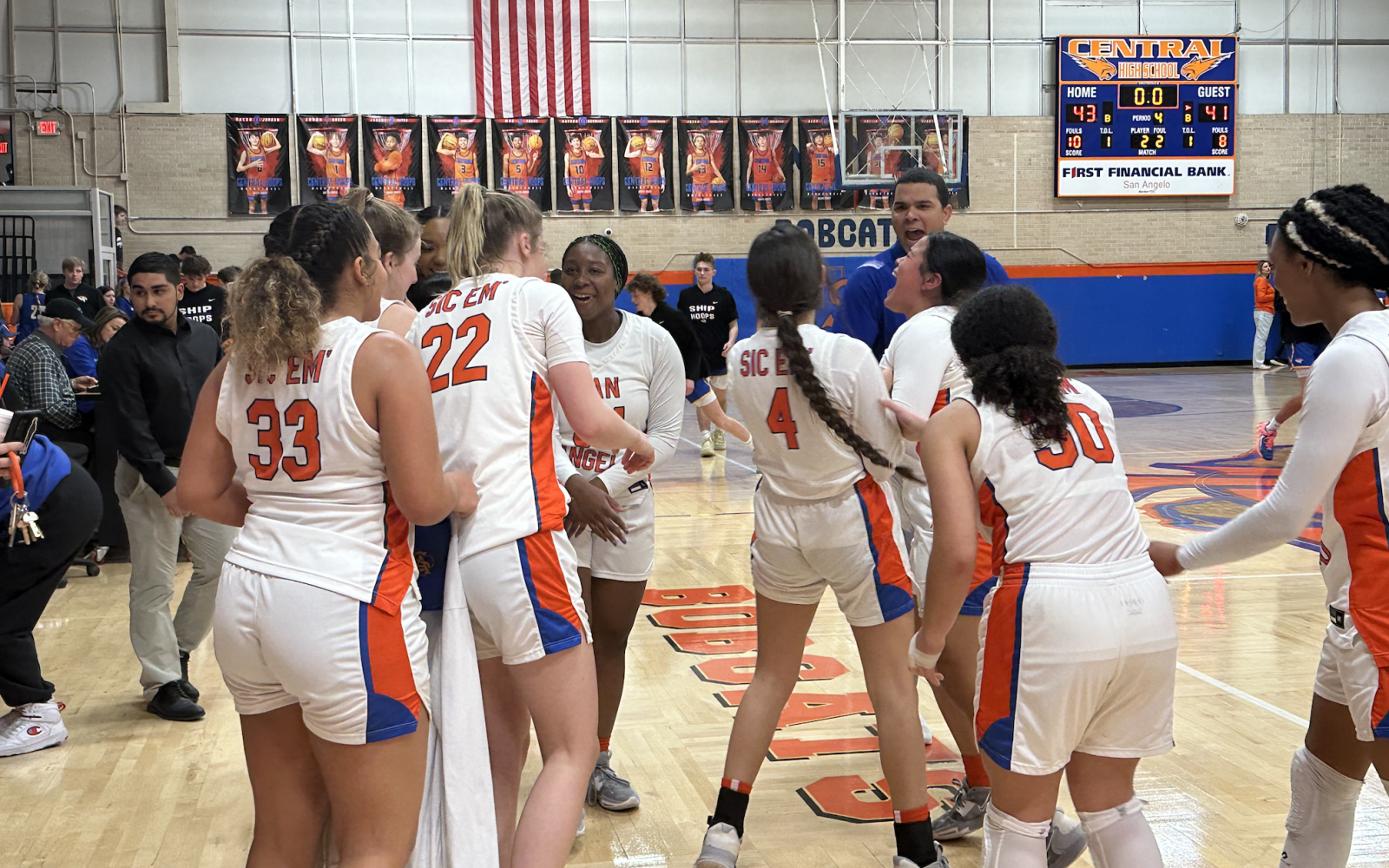 Lady Cats celebrate their victory over Frenship