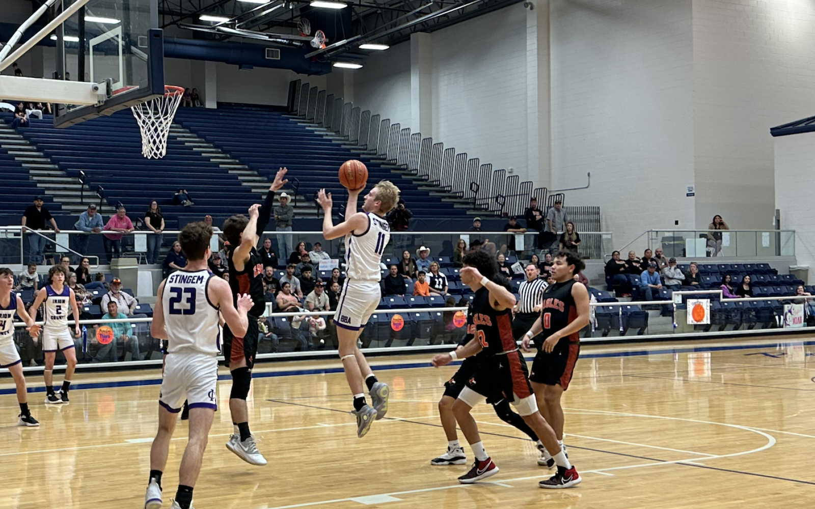 Trevin Coffell scores for the Hornets