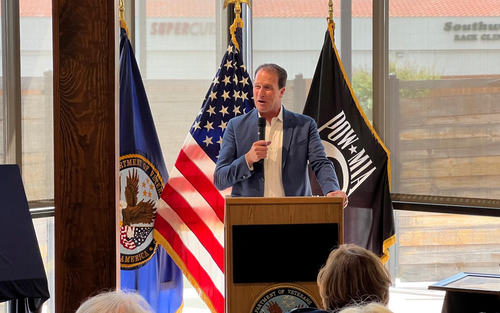Congressman August Pfluger remembers the Powells at the naming ceremony of the Col Charles and JoAnne Powell VA Clinic in San Angelo. 