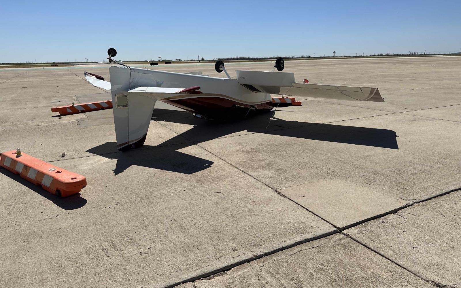 It is a Vans RV-7, a homebuilt side-by-side two-seater with a bubble canopy and dual stick controls. 