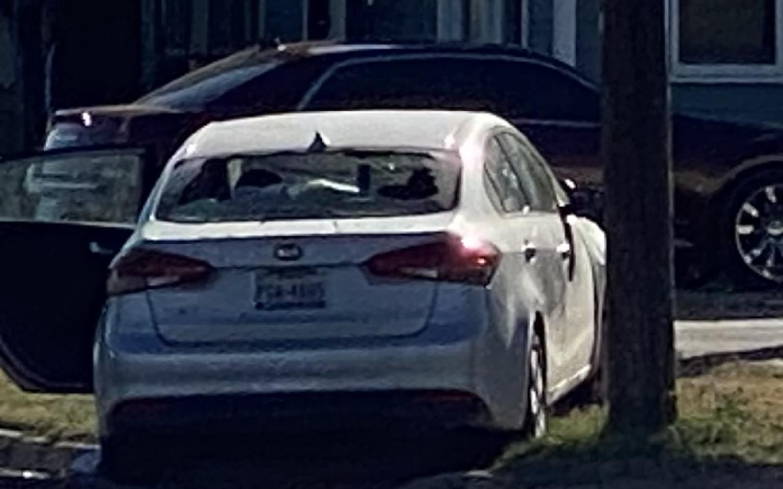 Car with the rear window possible shot out (LIVE! photo/James Bouligny)