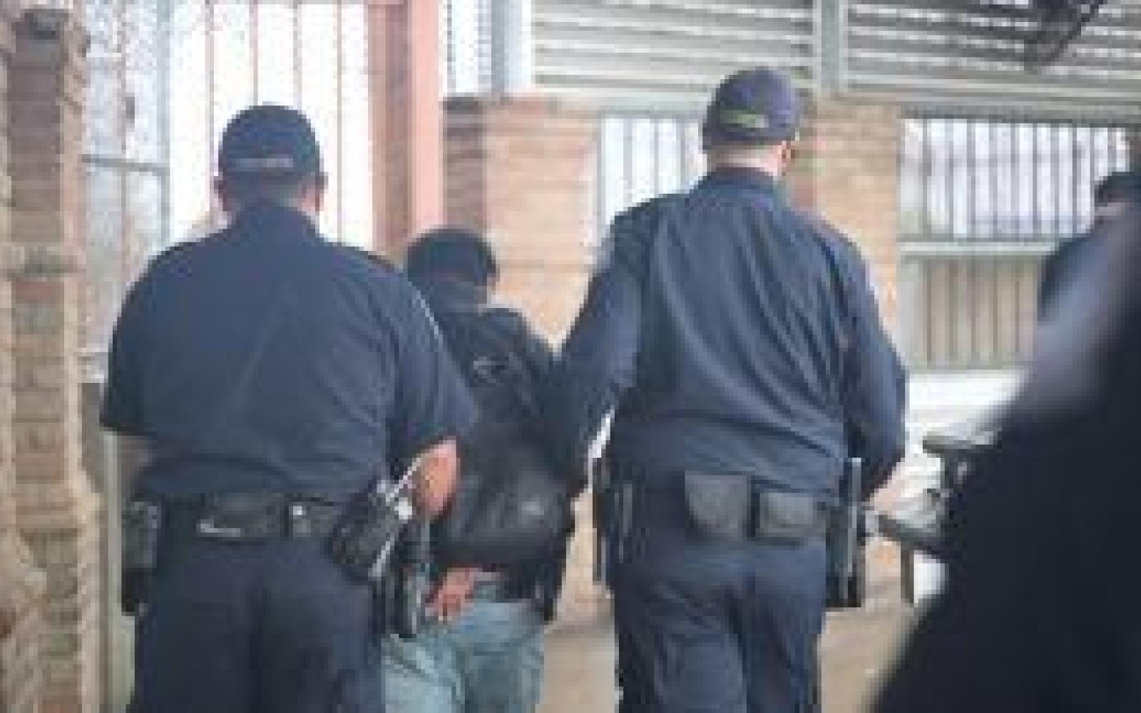 CBP Escort Wanted Suspect (Courtesy CBP)