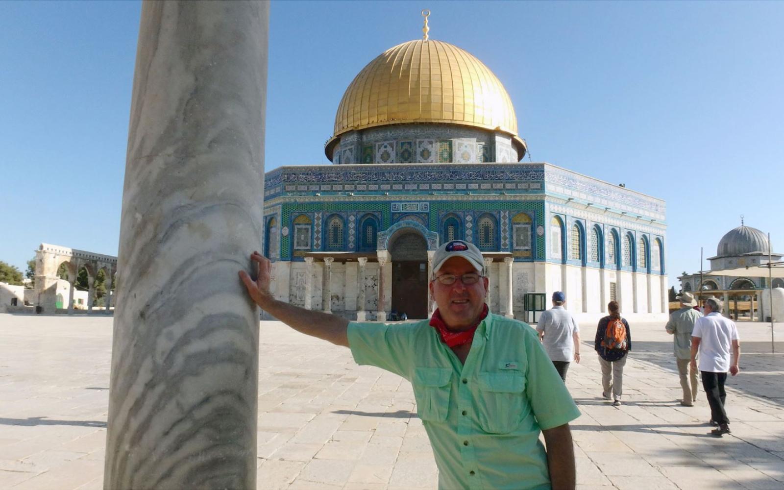 The author, Kendal Hemphill, posing for a photo in front of the Dome of the Rock Temple in Jeruseulum.