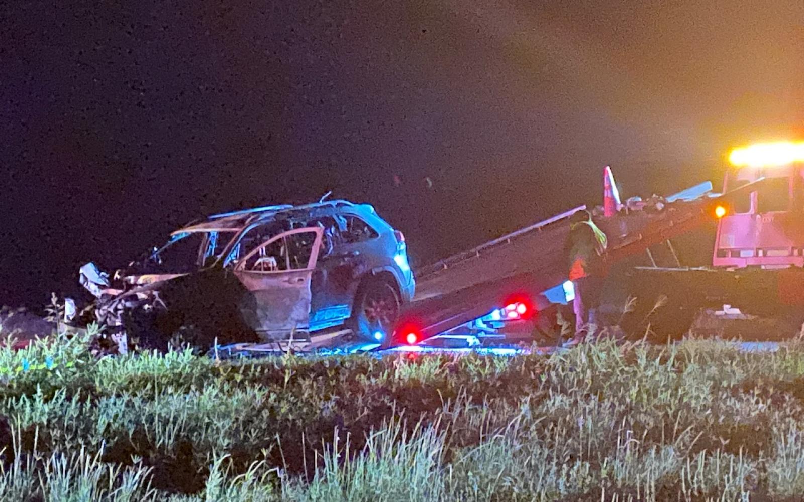 A vehicle, resembling a Chevrolet Equinox, was entirely engulfed in flames following a collision with a larger SUV on U.S. 87 S at the Hawk Ave. crossing on Oct. 1, 2023.