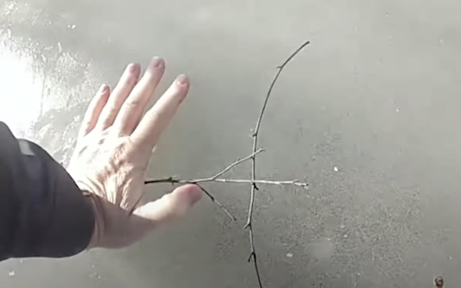 Officer Frantically Trying to Located Child Under Ice