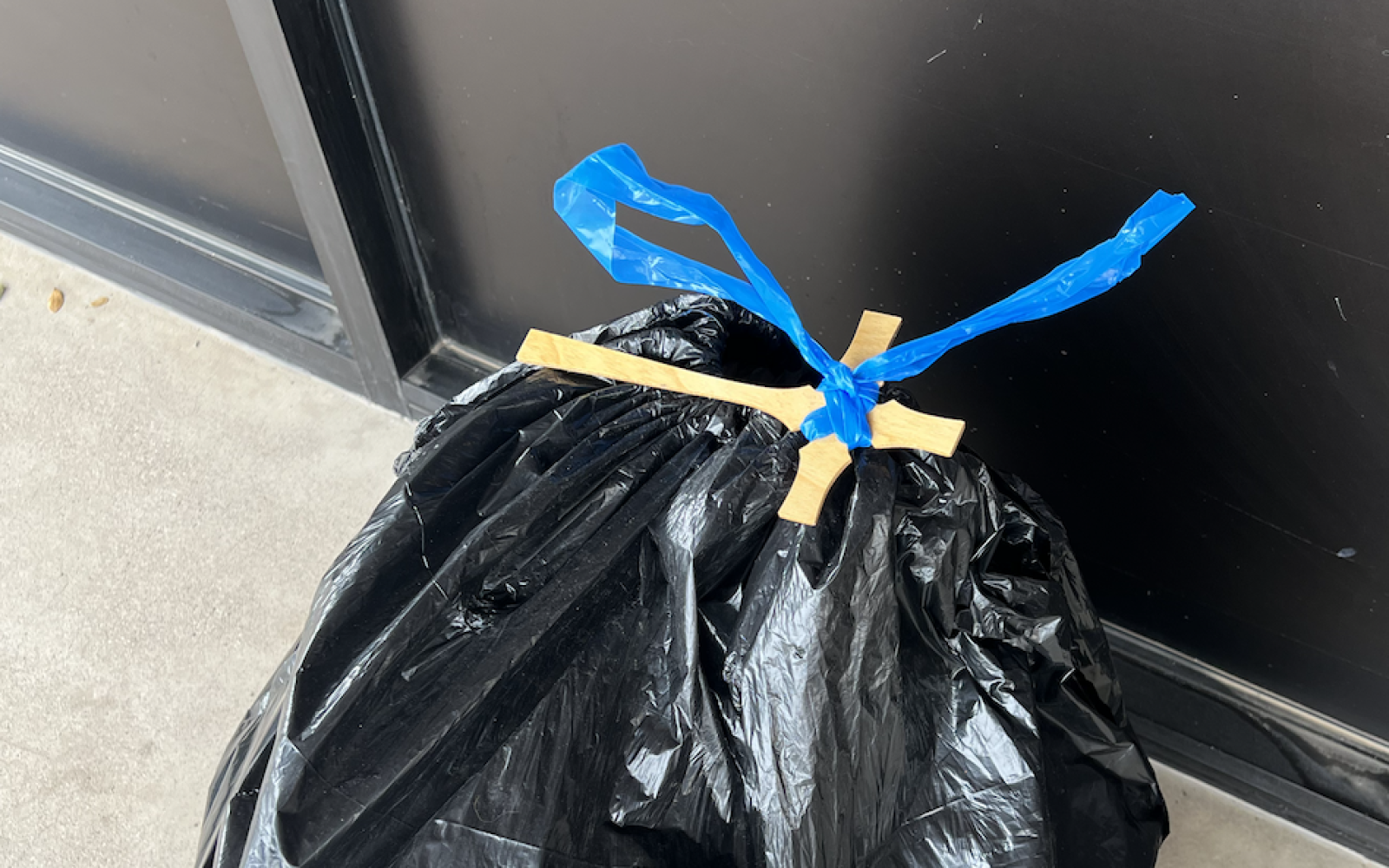 Wooden Cross on the Mysterious Package