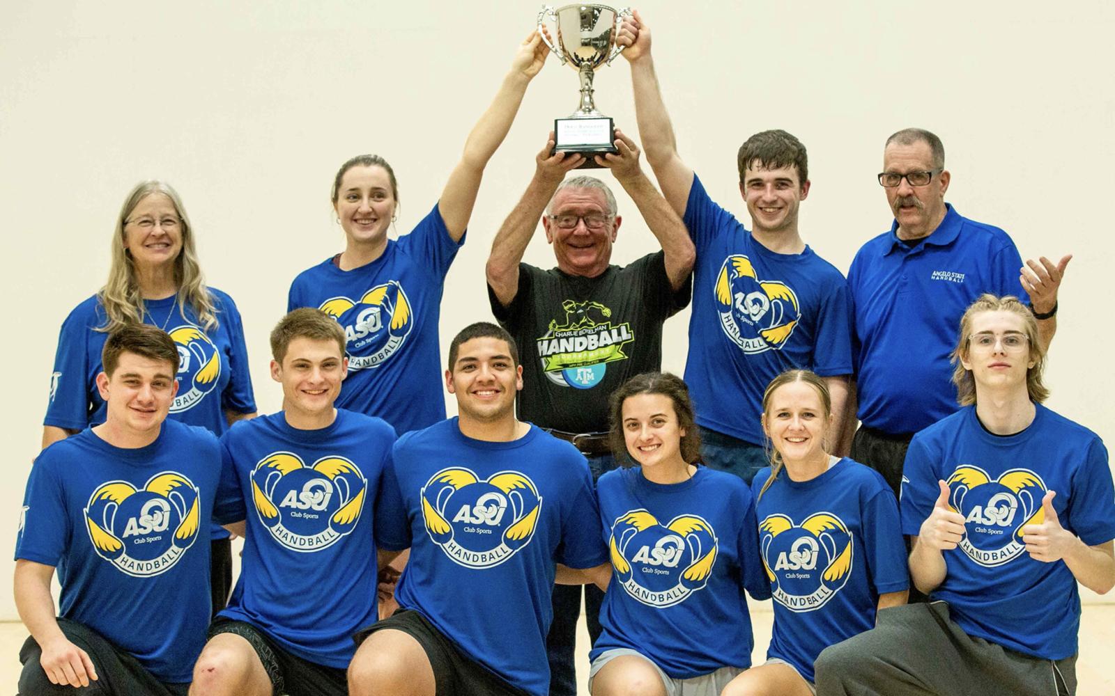 ASU Handball Club members with Doug Randolph (center) hoisting the Doug Randolph Cup