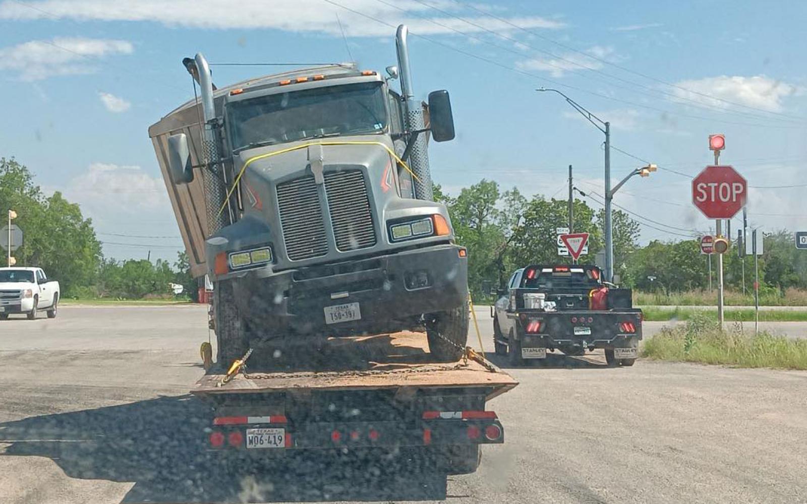 MILES, TX — This afternoon, a truck tractor towing a semi-trailer had its trailer cut in half after a train collided with it.