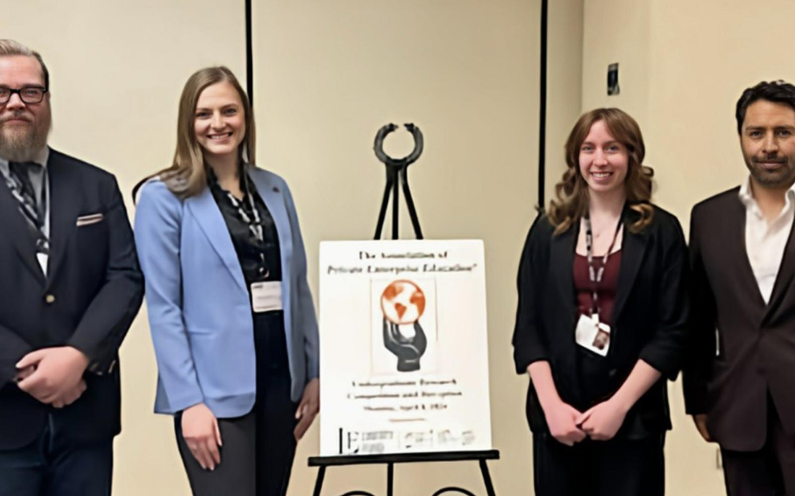 (L-R) Dr. Bryan Cutsinger, Emma Krehbiel, Maggie Brockman, Dr. Edwar Escalante