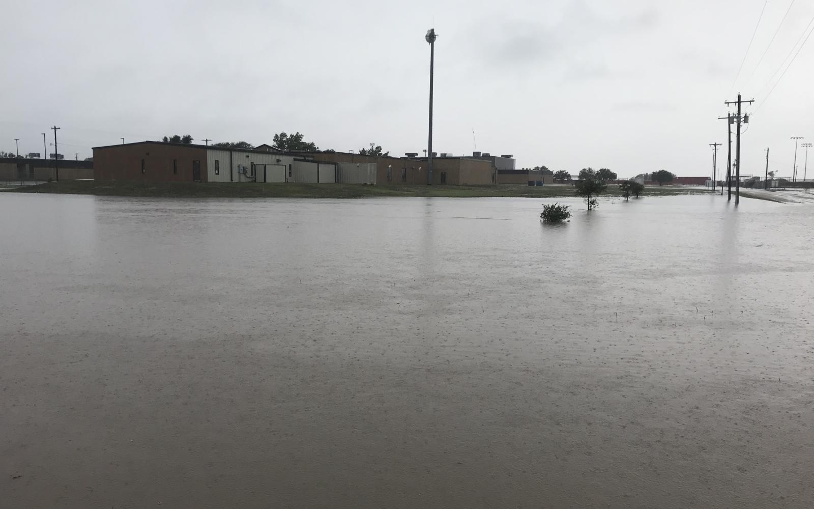 The area around Miles High School was submerged in water Tuesday, Sept. 3, 2024. With some roads in the area impassable due to flooding, Miles ISD canceled classes for the day.