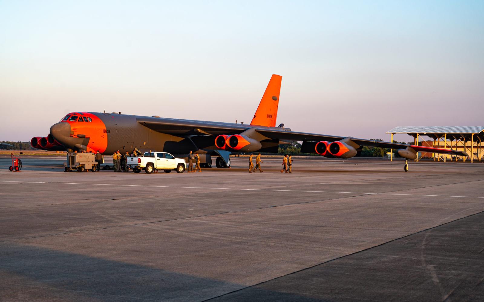  B-52H Stratofortress with a special orange paint scheme parks after landing at Barksdale Air Force Base, La., Sept. 30, 2024. The orange paint scheme was used to signify the B-52’s modernization while paying respect to its legacy. (U.S. Air Force photo by Airman 1st Class Aaron Hill)