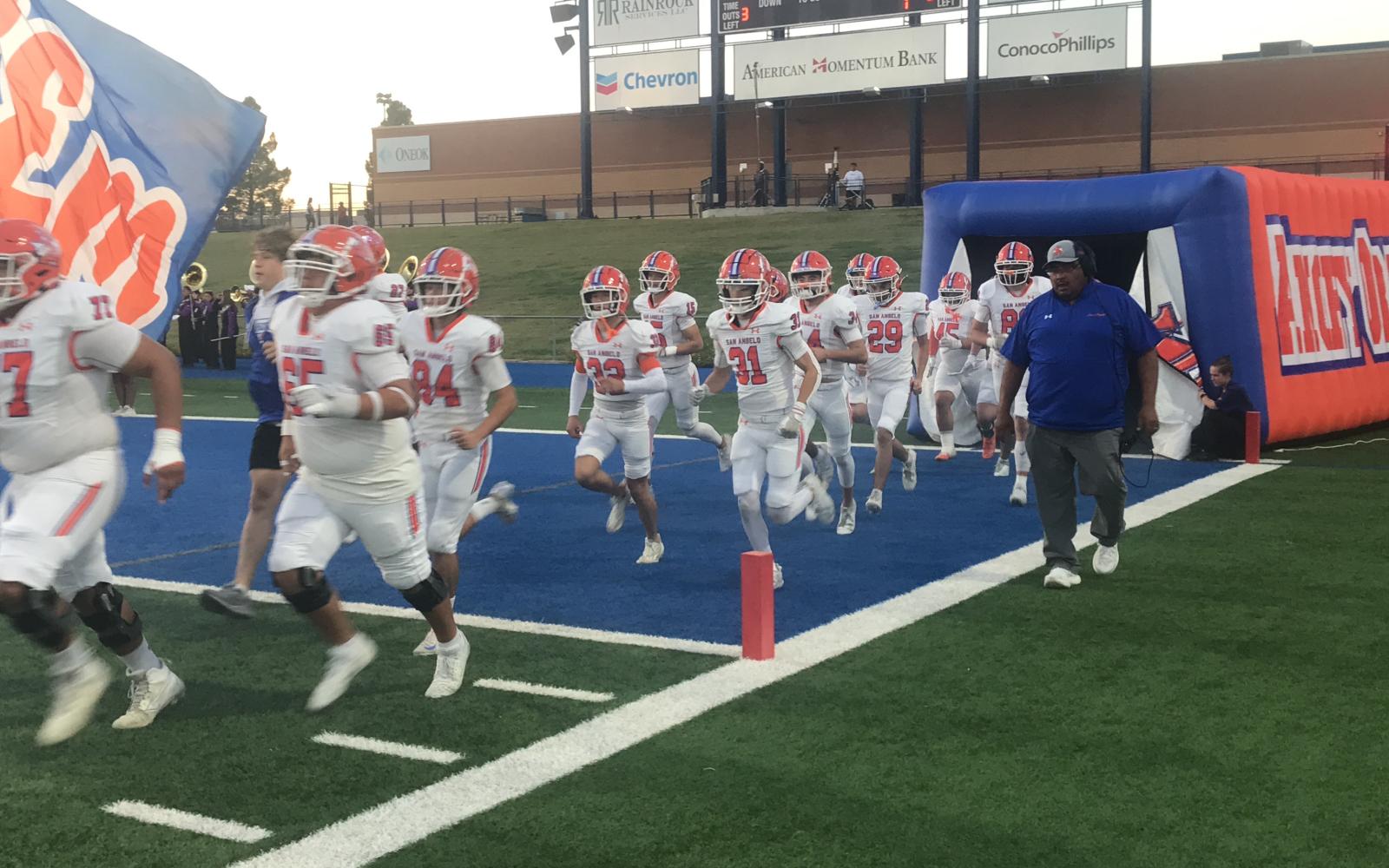 The Central Bobcats storm out of their tunnel before their game against Midland High on Friday, Oct. 25, 2024.