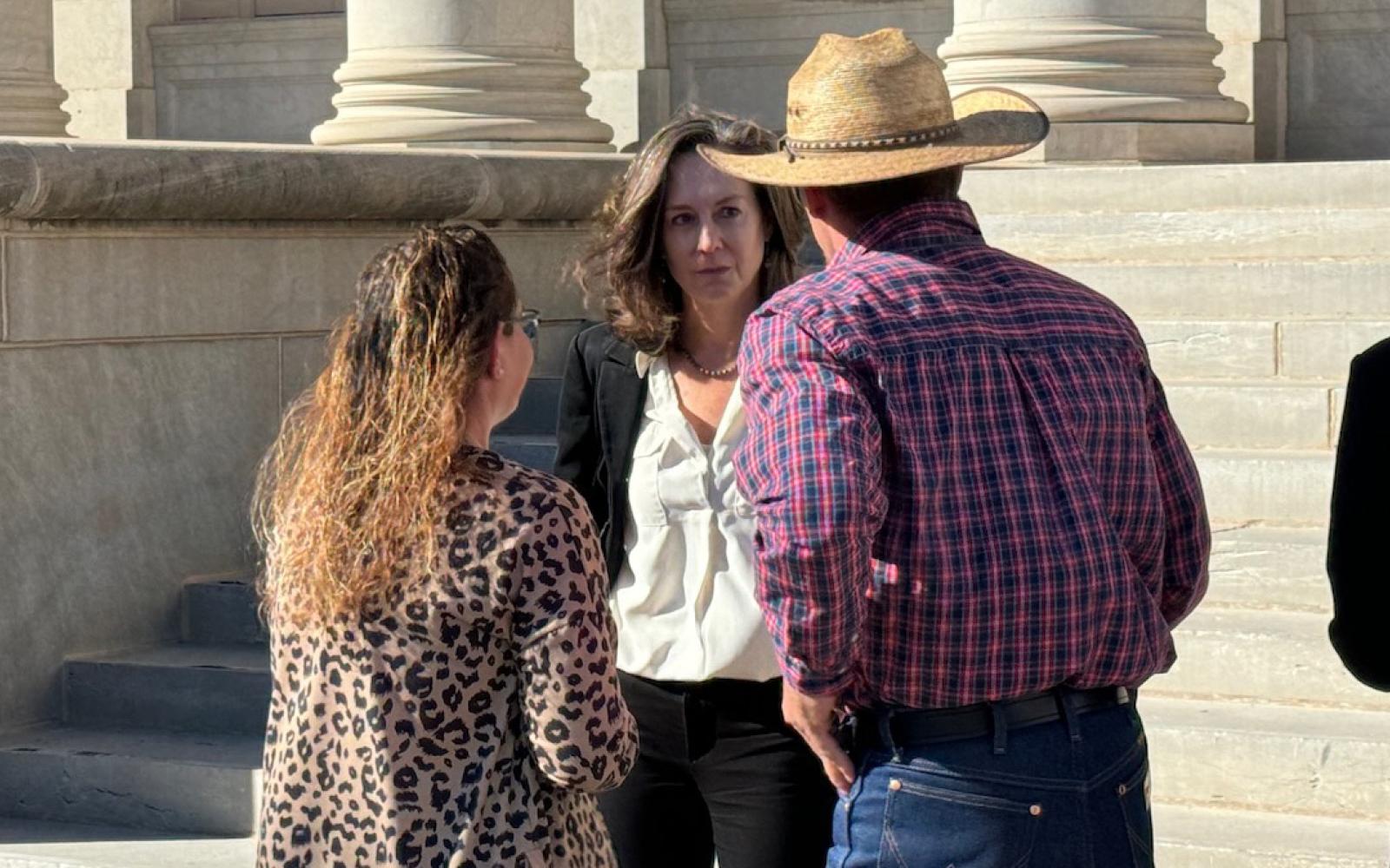 Faye and Jason Murrell discuss the verdict with 51st DA Allison Palmer. ADA Alexandra Porter is right of the camera.