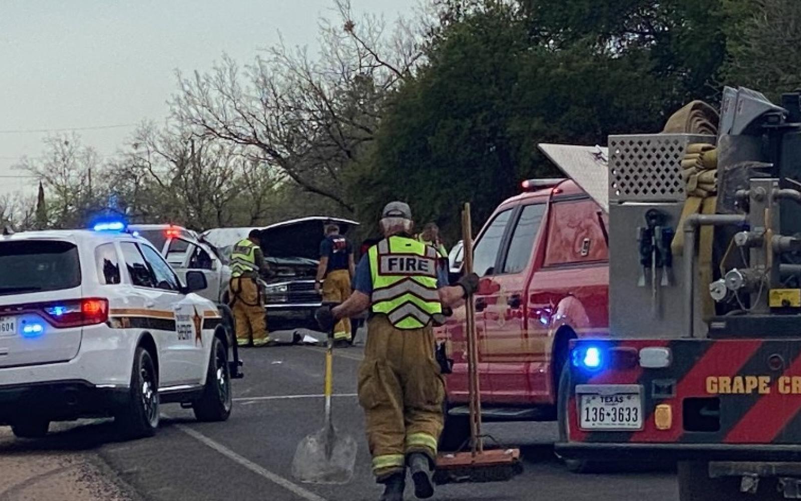 Sheriff Escorts Ambulance from Scene of Rollover Crash