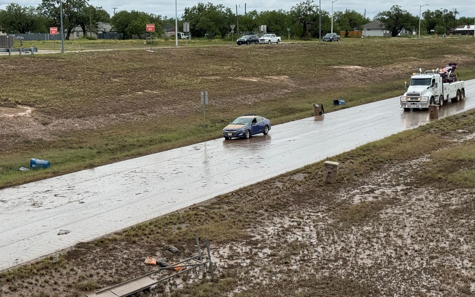 A very large wrecker from Home Motors arrived at around noon on July 4, 2025, presumably to haul off the old fire truck.