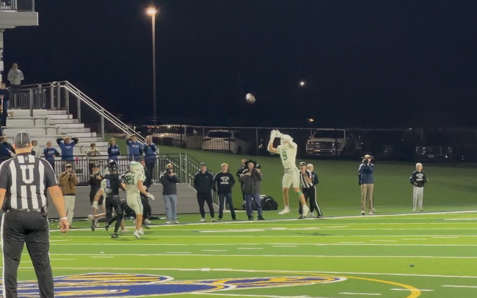 Wall Hawk's Gunner King bats down a pass in the State Semifinal