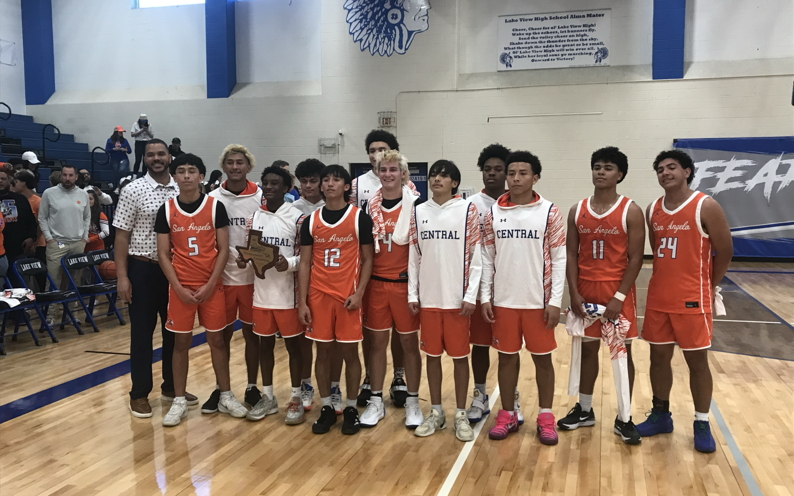 The Central Bobcats pose with the first-place trophy after defeating Lake View 74-39 ton win the Doug McCutchen Tournament title Saturday, Dec. 6, 2025.