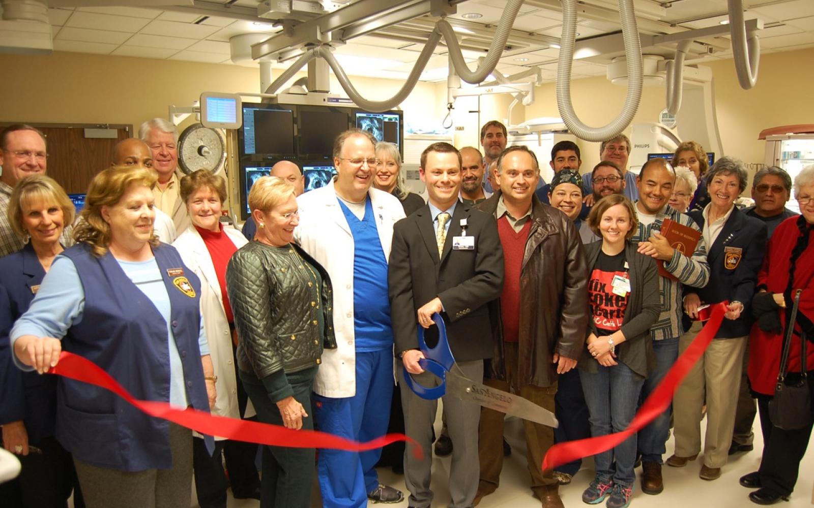 Dr. Michael Blanc in happier times, flanked by medical staff at the grand opening of State-of-the-Art Heart Catheterization Lab in 2014. (LIVE! Photo/Joe Hyde)