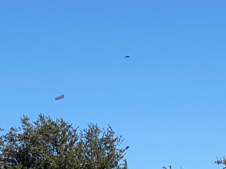 Col. Pfluger Banner Flyover (LIVE! Photo/Yantis Green)