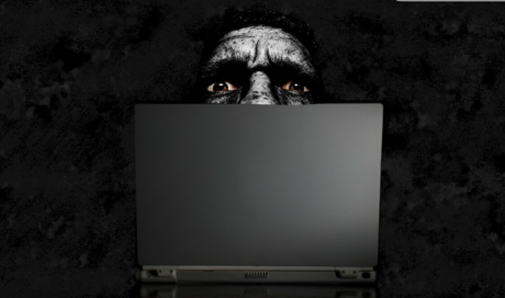 Disturbed Individual Watching a Computer Screen (Courtesy/Google)
