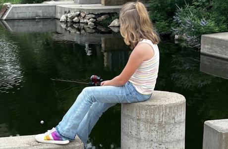 Young Lady Fishing in the Concho River Near Art Museum