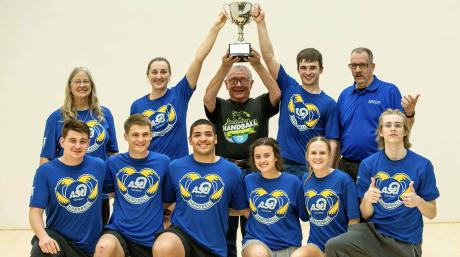 ASU Handball Club members with Doug Randolph (center) hoisting the Doug Randolph Cup