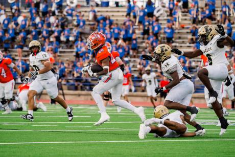 Central's Elijah Allen fights for yardage against Abilene High on Friday, Aug. 30, 2024, at San Angelo Stadium.