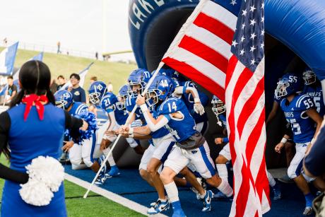 The Lake View Chiefs charge out of the tunnel before their game against Lamesa on Friday, Sept. 13, 2024, at San Angelo Stadium.