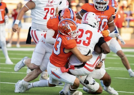 Mason Van Sickle (7) and Luisangel Garcia (33) combine for a tackle against Odessa High in their 2024 game at San Angelo Stadium.
