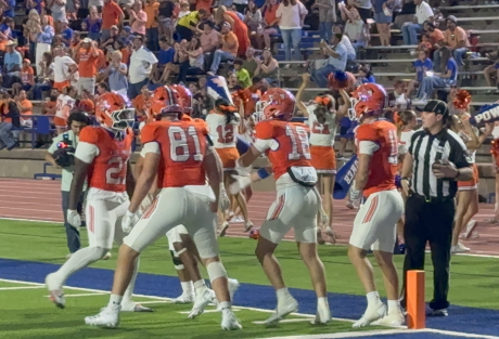 Central Bobcats celebrate a touchdown in the 'Cats' win over Abilene Cooper
