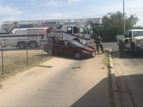 Two people were transported to the hospital by ambulance Thursday after a crash on Chadbourne Street sent a vehicle onto a sidewalk.