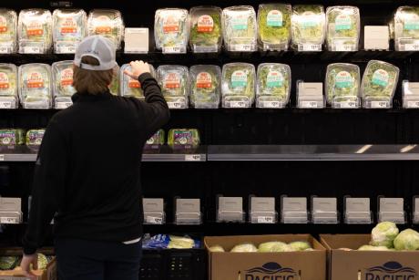 A customer stocks up on produce at an Austin H-E-B on Jan. 13, 2024.
