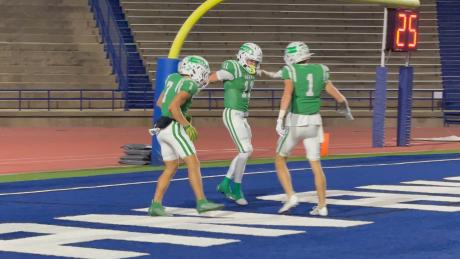The Wall Hawks celebrate after a touchdown against Idalou in the regional final at San Angelo Stadium on Friday, Dec. 5, 2025.