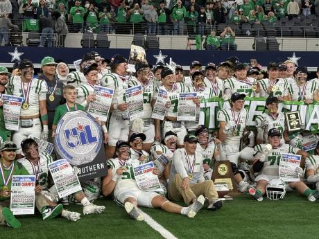 The Wall Hawks celebrate their 25-24 win over Newton in the Class 3A Division II state final on Thursday, Dec. 18, 2025, at AT&T Stadium in Arlington.