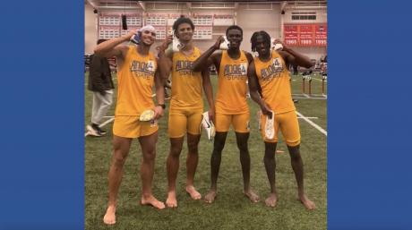 William Opare (second from right) poses with Rami Balti, Taylor Briggs, and Jahleel Armstrong after the 4x400 meter relay.