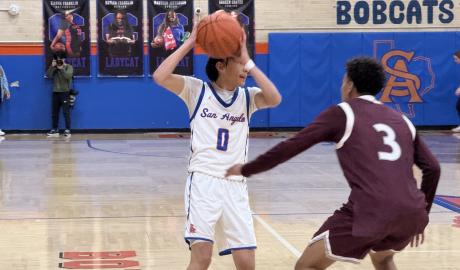 Central Bobcats' Ean McNeill in action against Midland Legacy