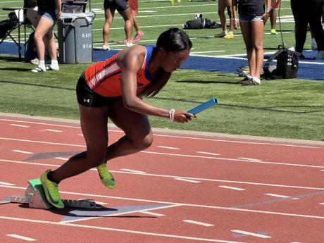 A San Angelo Central athletes takes off with the baton during the San Angelo Relays on Friday, March 13, 2026.