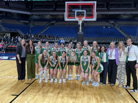 The Wall girls basketball team poses with its championship trophy after defeating Central Heights 49-34 in the Class 3A Division II state final Monday, March 6, 2026, at the Alamodome in San Antonio.