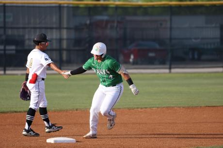 Abilene High second baseman Xavier De La Cruz congratulates Wall's Reid Ballard after his home run Friday, April 10, 2026.