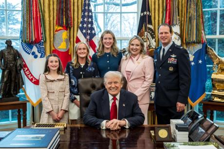 August Pfluger poses with his family and President Donald Trump on March 6, 2026, after his retirement from the U.S. Air Force.