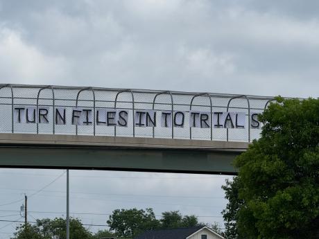 A group of liberal protestors received attention Wednesday evening in San Angelo by placing signs above South Bryant Boulevard.