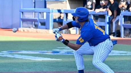 Angelo State's Hunter Holt lays down a bunt during the 2026 season against West Texas A&M.