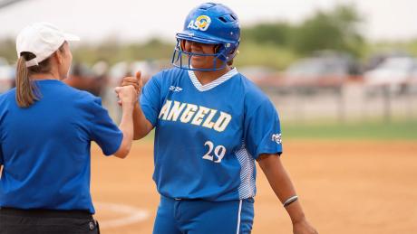 Angelo State's Zoey Sifuentes fist bumps Rambelles assistant coach Katie Scott during their doubleheader against UT Permian Basin in Odessa on Wednesday, April 1, 2026.